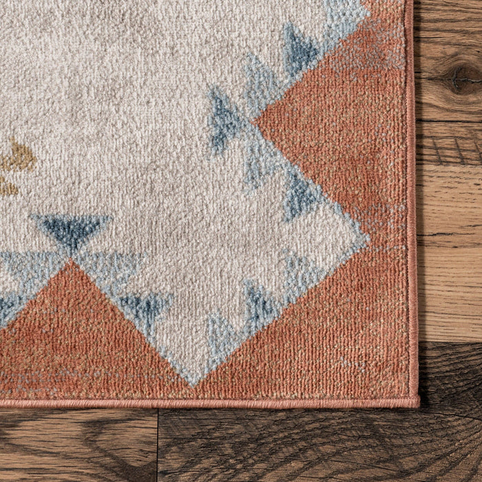 Faviola Southwestern Bordered Area Rug: Rust / Rectangle / 5' 3" x 7' 7"
