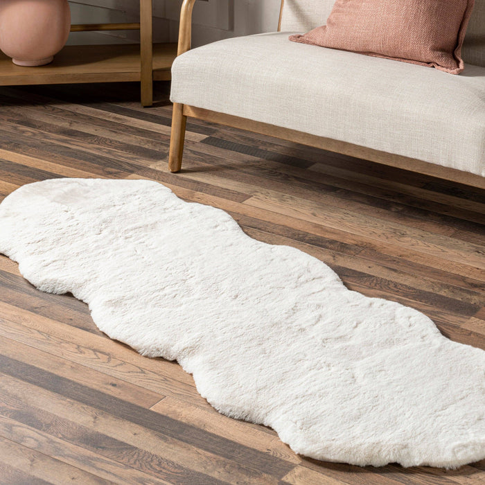 Eline Faux Sheepskin Machine Washable Area Rug: White / Shaped / 2' x 6'
