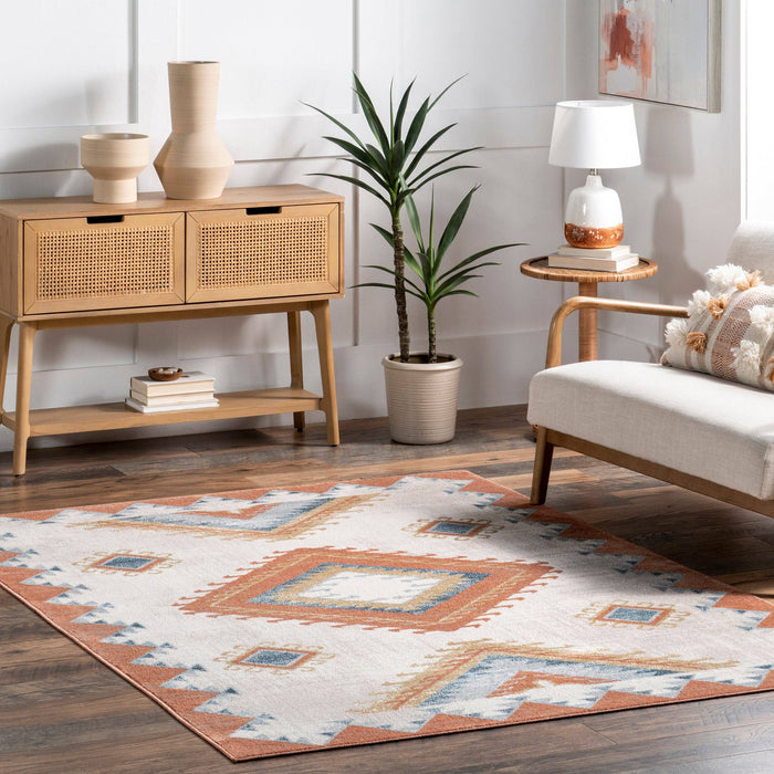 Faviola Southwestern Bordered Area Rug: Rust / Rectangle / 5' 3" x 7' 7"