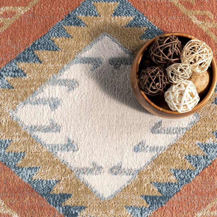 Faviola Southwestern Bordered Area Rug: Rust / Rectangle / 5' 3" x 7' 7"
