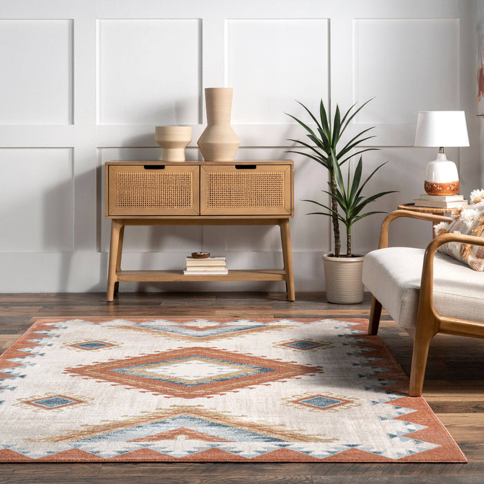 Faviola Southwestern Bordered Area Rug: Rust / Rectangle / 5' 3" x 7' 7"