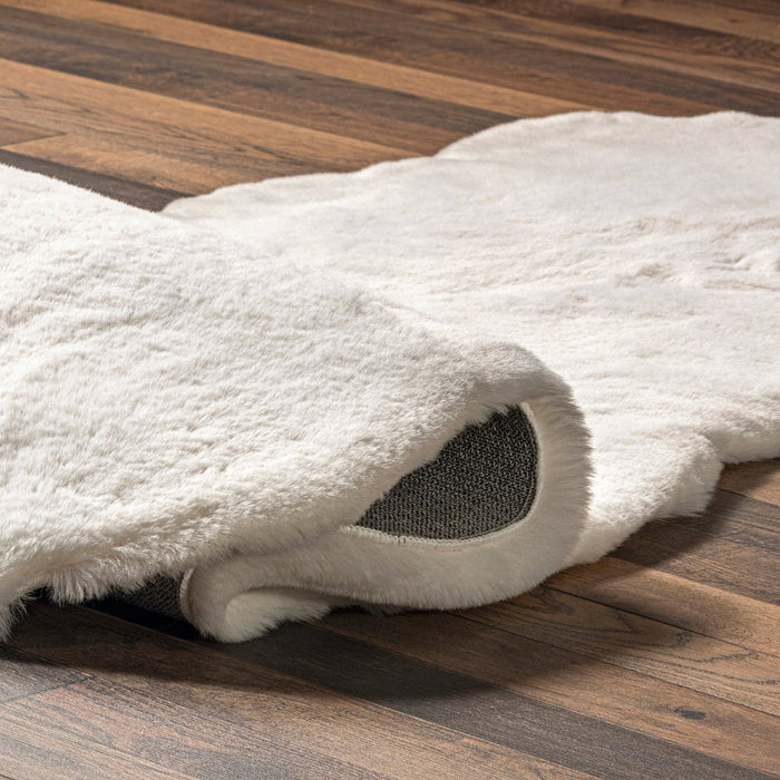 Eline Faux Sheepskin Machine Washable Area Rug: White / Shaped / 2' x 6'