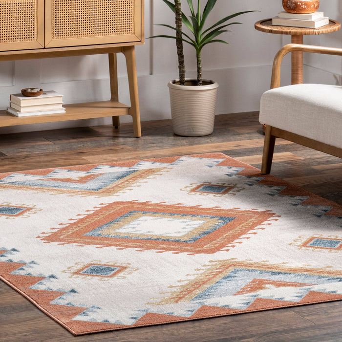 Faviola Southwestern Bordered Area Rug: Rust / Rectangle / 5' 3" x 7' 7"