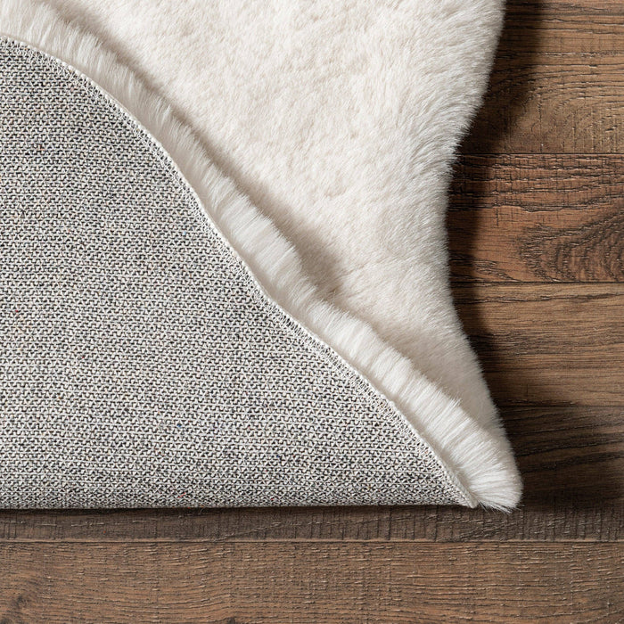 Eline Faux Sheepskin Machine Washable Area Rug: White / Shaped / 2' x 6'