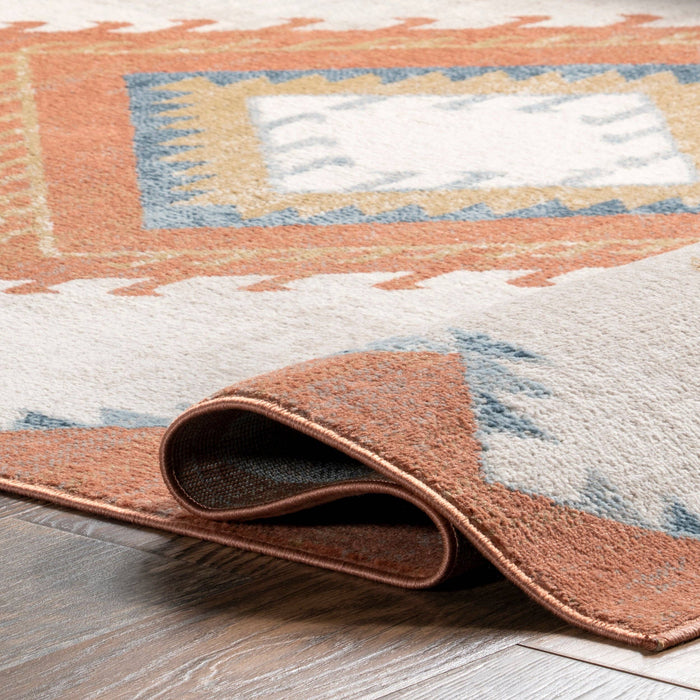 Faviola Southwestern Bordered Area Rug: Rust / Rectangle / 5' 3" x 7' 7"