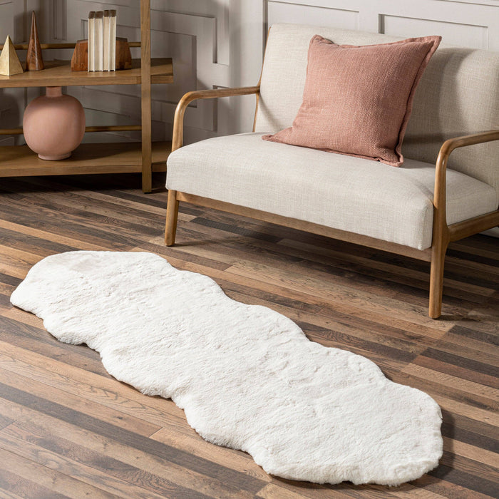 Eline Faux Sheepskin Machine Washable Area Rug: White / Shaped / 2' x 6'